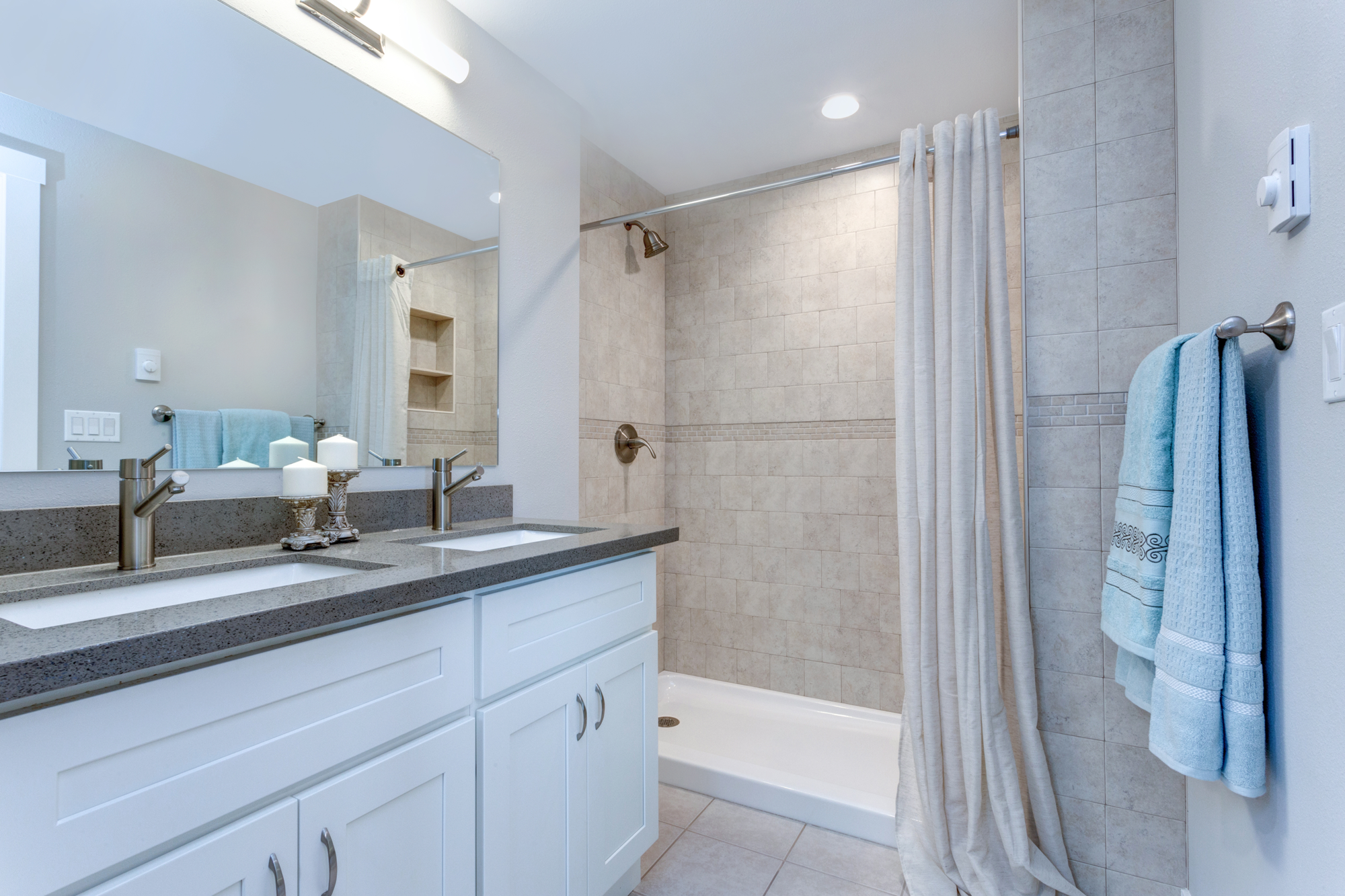 Tan tiled bathroom